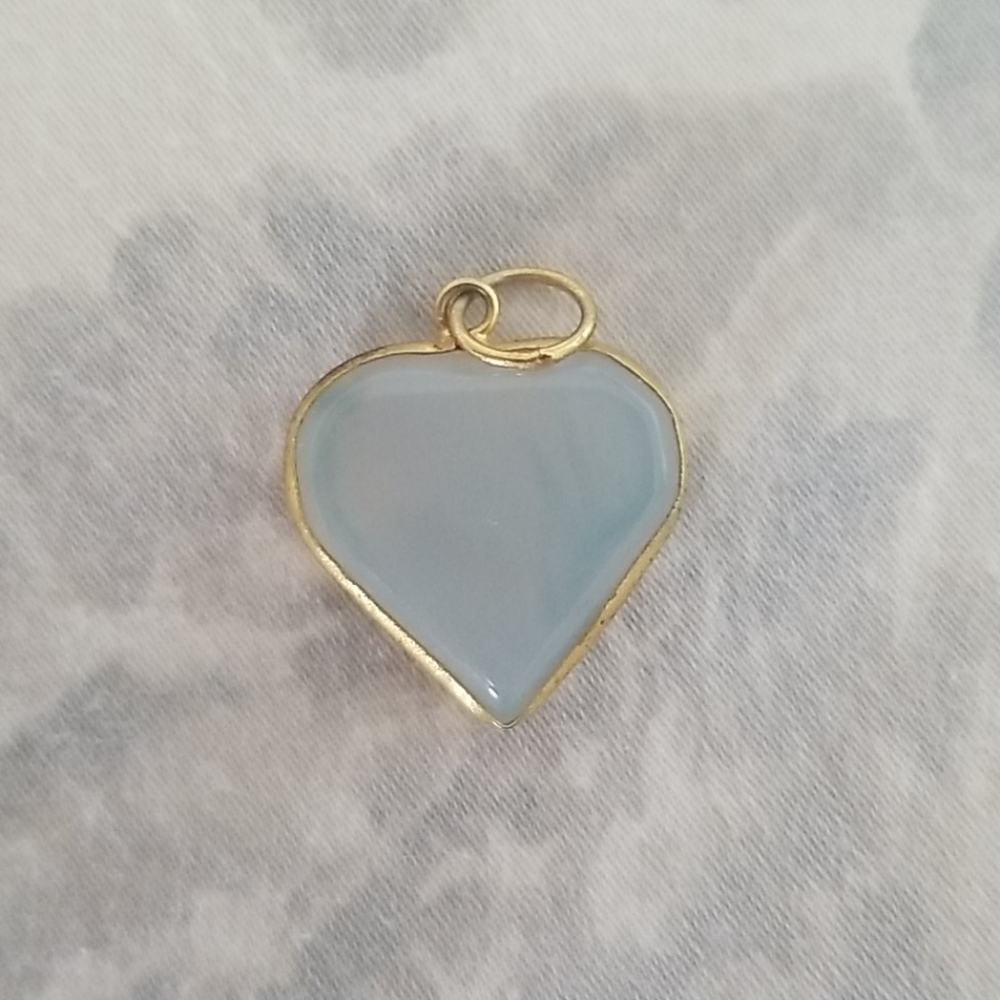 Blue and gold colored heart pendant